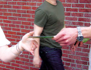 teammemberhandingsomethingout.jpg
